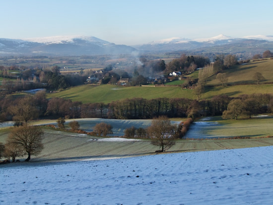 Looking towards Bettws Newydd, the Blorenge and the Sugarloaf